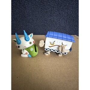 Two figures from the‎ Yo-kai Watch: Medal Moments Komasan & Noway.